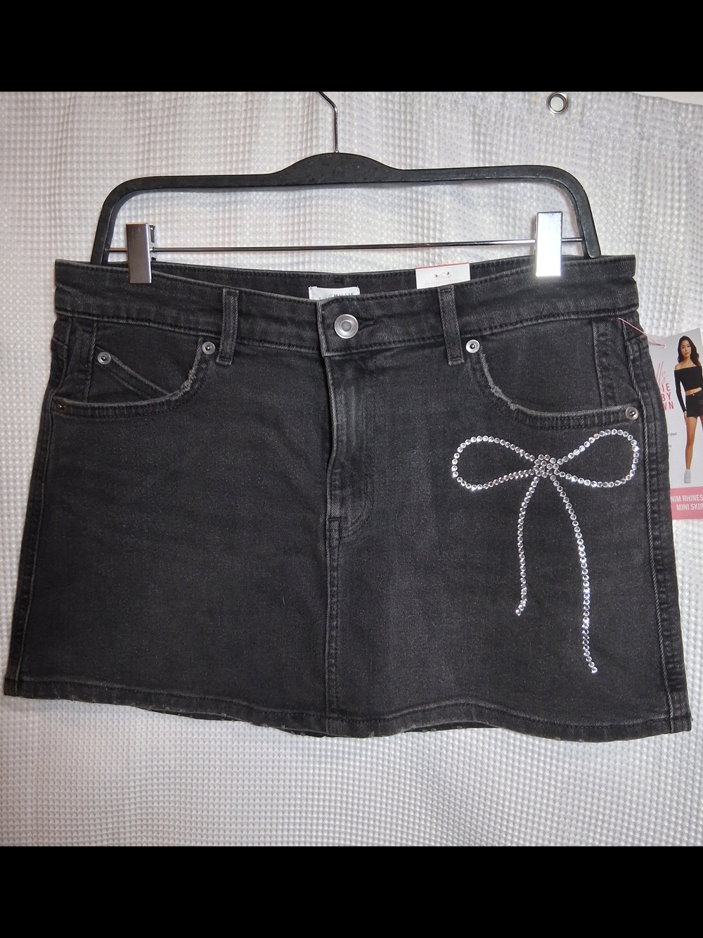 Black Denim Mini Skirt with Rhinestone Bow Accent